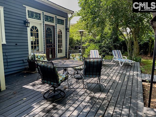 1220 Calhoun St, Newberry, SC 29108 - wooden terrace with outdoor dining area