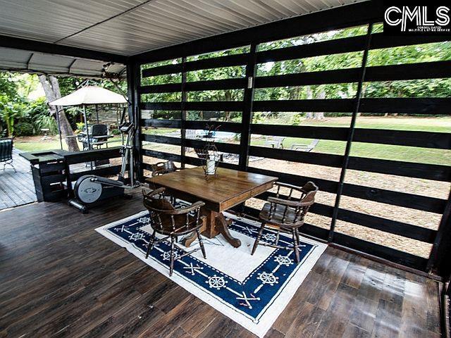 1220 Calhoun St, Newberry, SC 29108 - sunroom / solarium with outdoor dining space