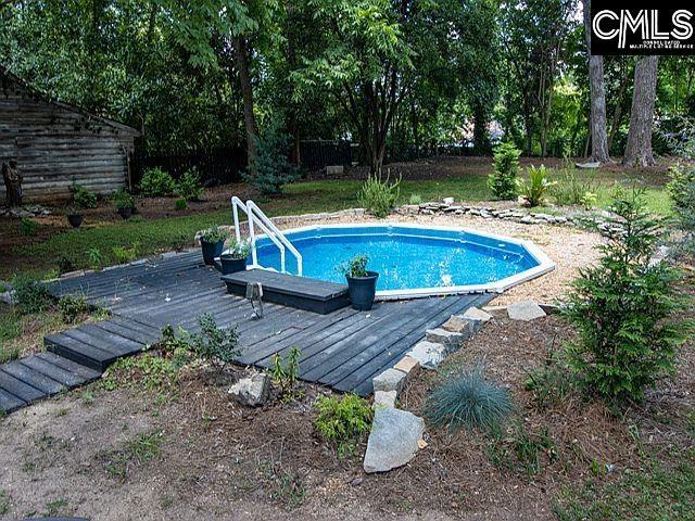 1220 Calhoun St, Newberry, SC 29108 - outdoor pool with a wooden deck