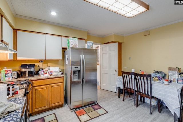2161 Tanglewood Rd, Sumter, SC 29154 - kitchen with stainless steel fridge with ice dispenser, light wood-type flooring, crown molding, under cabinet range hood, and range with electric cooktop