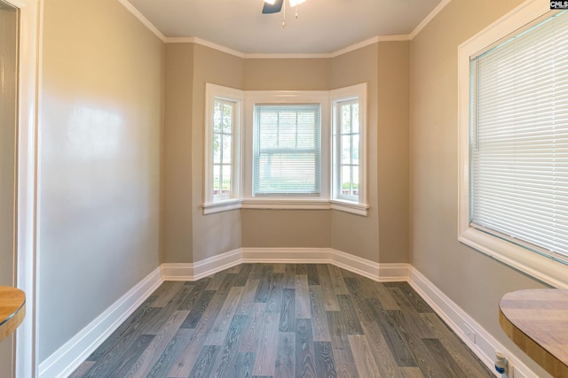 318 Summerland Ave, Batesburg, SC 29006 - empty room featuring dark wood-type flooring, ornamental molding, and ceiling fan