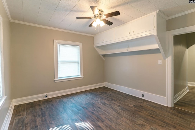 318 Summerland Ave, Batesburg, SC 29006 - empty room with dark wood-style floors, a ceiling fan, and crown molding