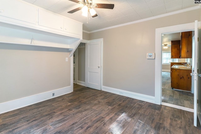 318 Summerland Ave, Batesburg, SC 29006 - unfurnished bedroom featuring dark wood-type flooring, crown molding, and ceiling fan