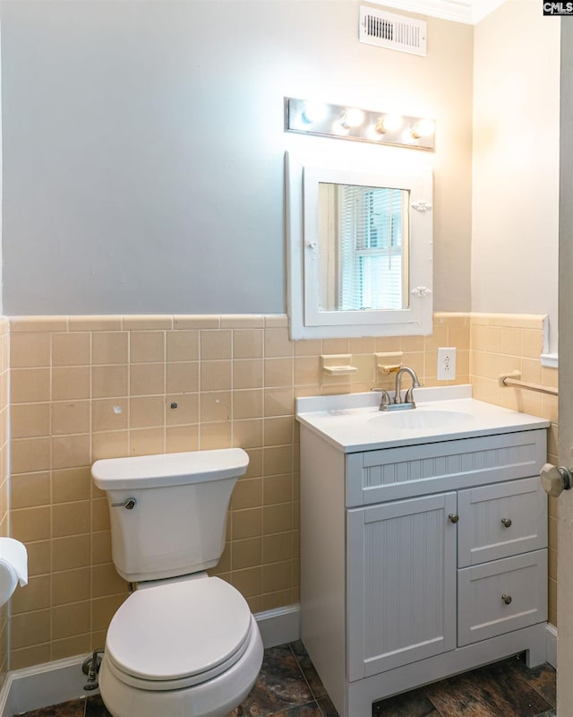 318 Summerland Ave, Batesburg, SC 29006 - bathroom featuring tile walls, vanity, and wainscoting