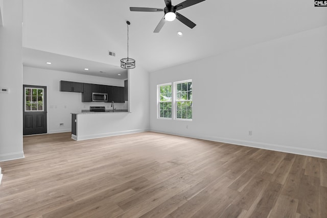 3723 Hoyt St, Columbia, SC 29223 - unfurnished living room featuring high vaulted ceiling, healthy amount of natural light, light wood-style floors, a ceiling fan, and recessed lighting