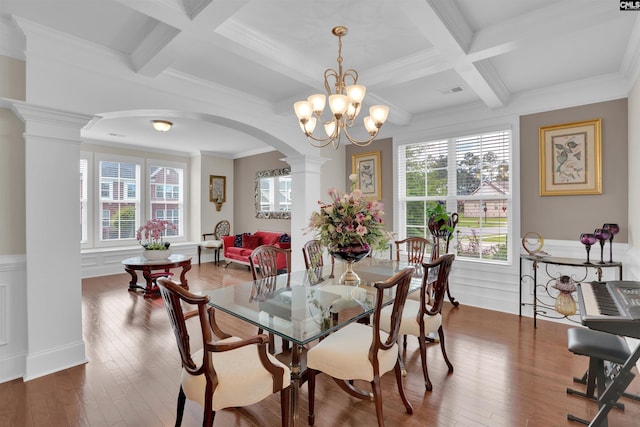 769 Broad Leaf Rd, Elgin, SC 29045 - dining room with coffered ceiling, arched walkways, ornate columns, a chandelier, and beam ceiling