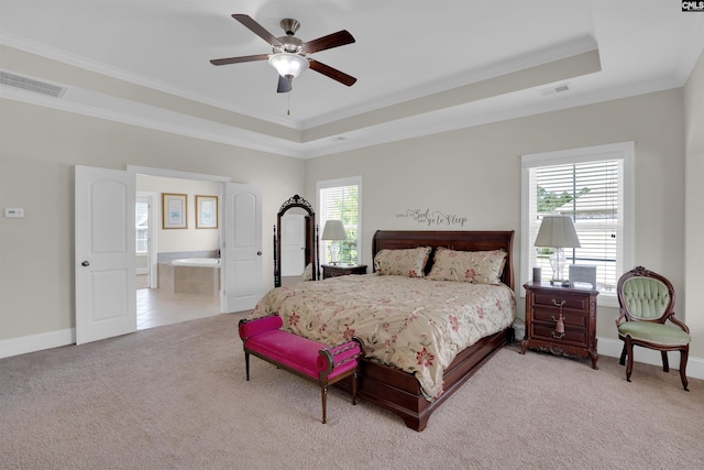 769 Broad Leaf Rd, Elgin, SC 29045 - bedroom featuring multiple windows, light carpet, a tray ceiling, and ornamental molding