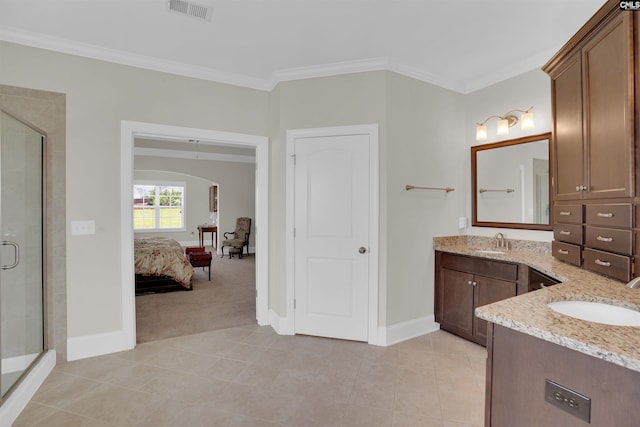 769 Broad Leaf Rd, Elgin, SC 29045 - full bathroom with a stall shower, two vanities, crown molding, and tile patterned floors