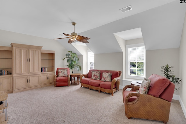 769 Broad Leaf Rd, Elgin, SC 29045 - living room featuring light colored carpet, vaulted ceiling, and a ceiling fan