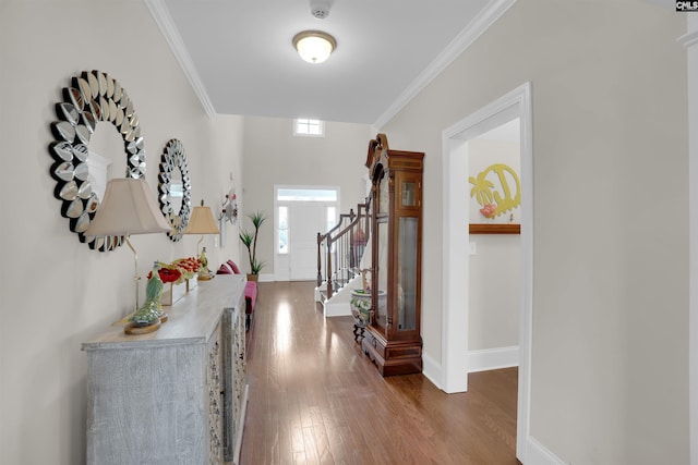 769 Broad Leaf Rd, Elgin, SC 29045 - hallway with wood finished floors, ornamental molding, and stairway