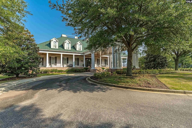 769 Broad Leaf Rd, Elgin, SC 29045 - new england style home with a porch, a metal roof, and a standing seam roof