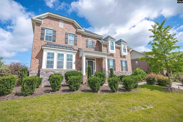 769 Broad Leaf Rd, Elgin, SC 29045 - view of front of home with a front yard and brick siding