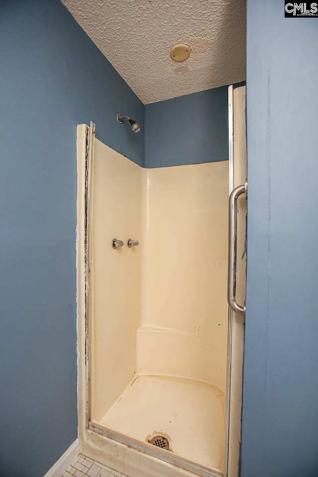 113 Brookland Cir, Columbia, SC 29204 - full bathroom with a stall shower and a textured ceiling