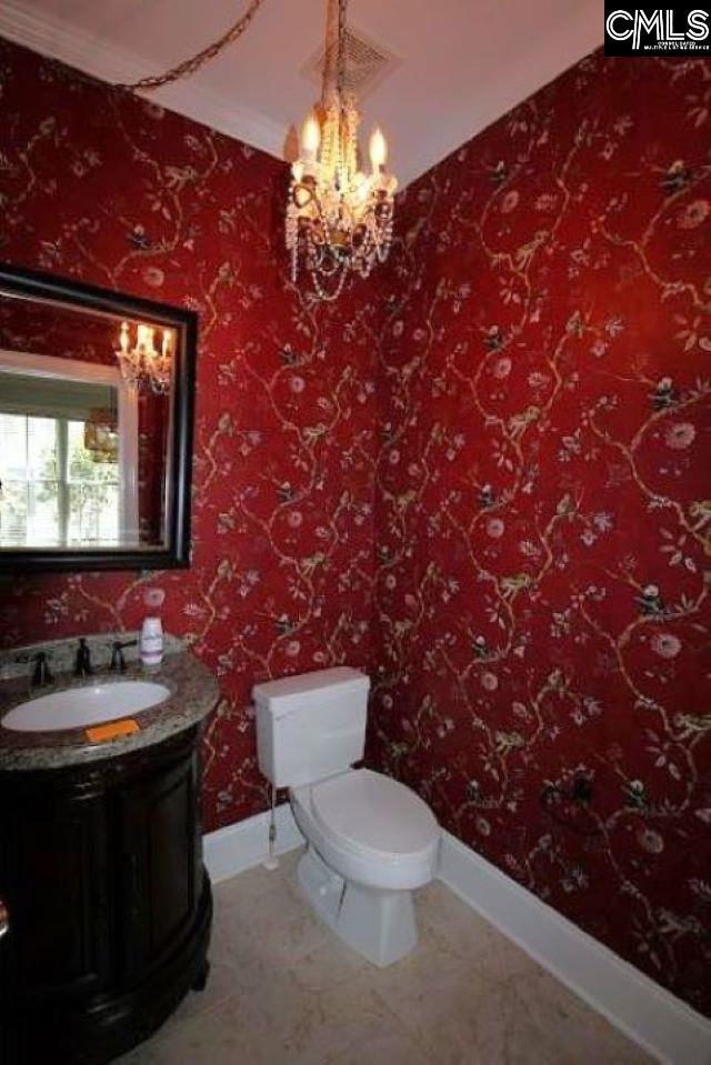 392 Highland Point Dr, Columbia, SC 29229 - half bathroom featuring vanity and a chandelier