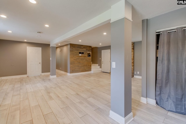 105 Garmony Cir, Columbia, SC 29212 - empty room with light wood finished floors, recessed lighting, and stairway