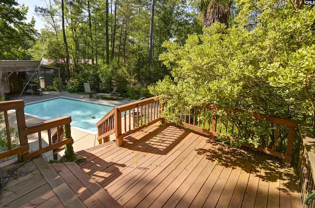 730 Stoneridge Rd, Ridgeway, SC 29130 - deck with an outdoor pool and view of wooded area
