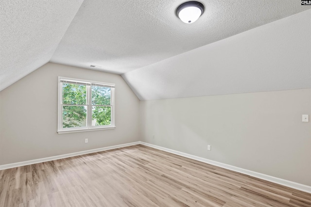 265 Thornhill Rd, Columbia, SC 29212 - bonus room featuring light wood-type flooring, a textured ceiling, and lofted ceiling