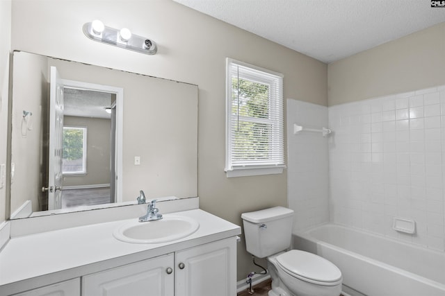 265 Thornhill Rd, Columbia, SC 29212 - bathroom with a textured ceiling, healthy amount of natural light, vanity, and shower / tub combination