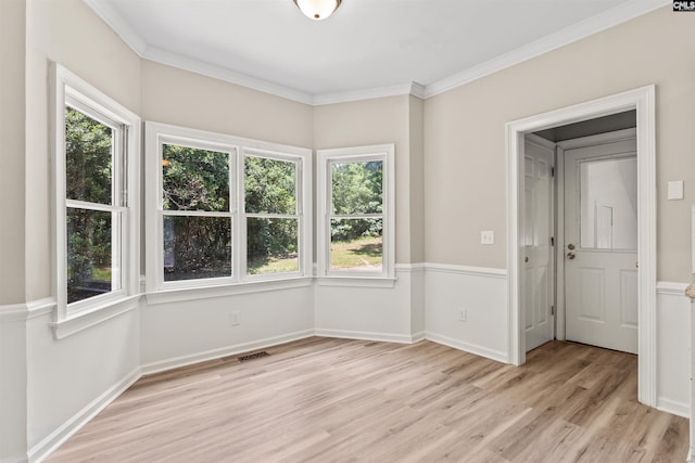 265 Thornhill Rd, Columbia, SC 29212 - empty room featuring light wood-style flooring, plenty of natural light, and ornamental molding