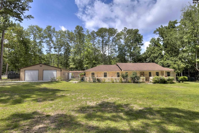 1220 Barnwell Dr, Sumter, SC 29154 - single story home featuring a garage, an outdoor structure, a front yard, and view of scattered trees