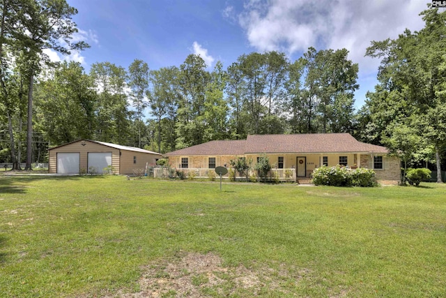 1220 Barnwell Dr, Sumter, SC 29154 - single story home with a garage, an outdoor structure, a front yard, covered porch, and view of scattered trees