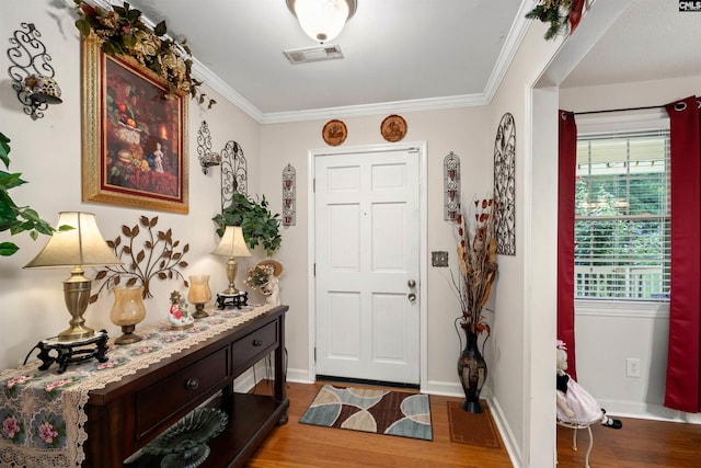 1220 Barnwell Dr, Sumter, SC 29154 - foyer entrance featuring wood finished floors and ornamental molding