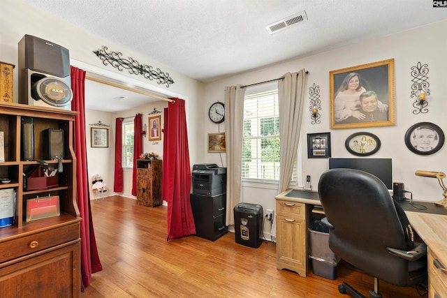 1220 Barnwell Dr, Sumter, SC 29154 - office featuring light wood-style floors and a textured ceiling