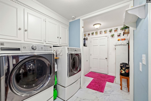 1220 Barnwell Dr, Sumter, SC 29154 - laundry area featuring washer and clothes dryer, marble look tiles, a textured ceiling, cabinet space, and crown molding