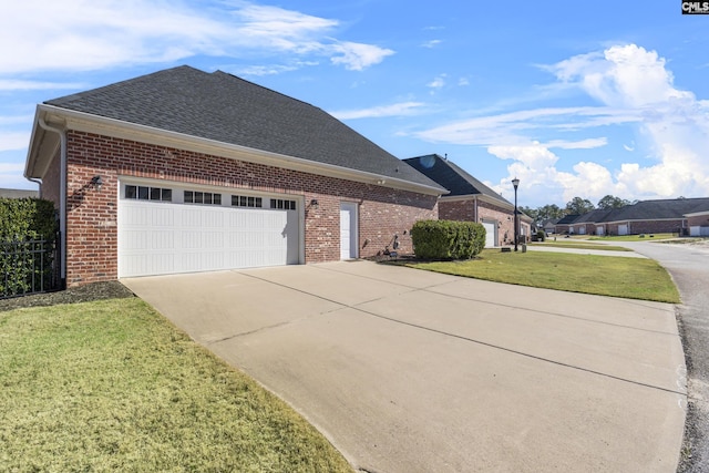 143 Club Ridge Rd, Elgin, SC 29045 - view of side of home featuring brick siding, concrete driveway, an attached garage, and a shingled roof