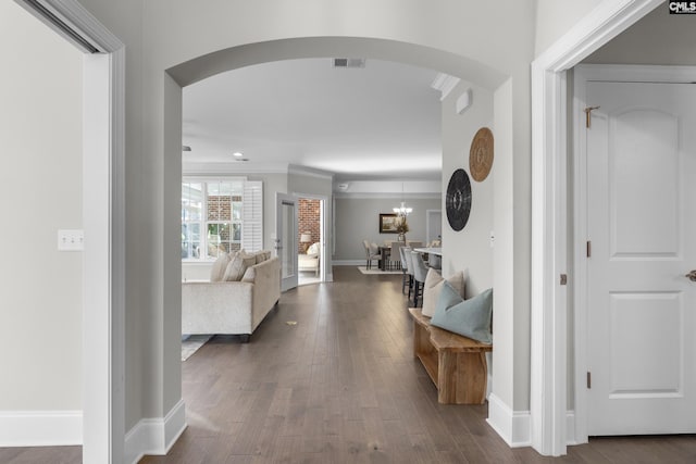 143 Club Ridge Rd, Elgin, SC 29045 - hall with arched walkways, dark wood-type flooring, and ornamental molding
