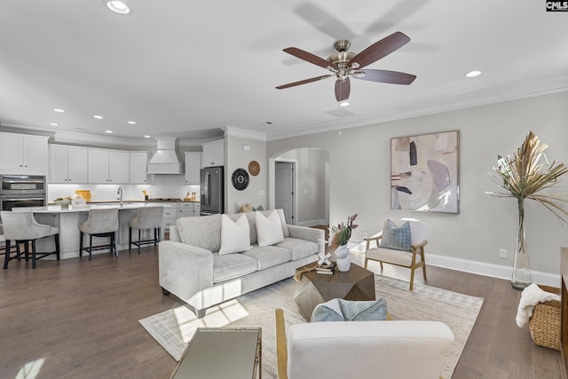 143 Club Ridge Rd, Elgin, SC 29045 - living room with arched walkways, crown molding, recessed lighting, a ceiling fan, and dark wood-style floors