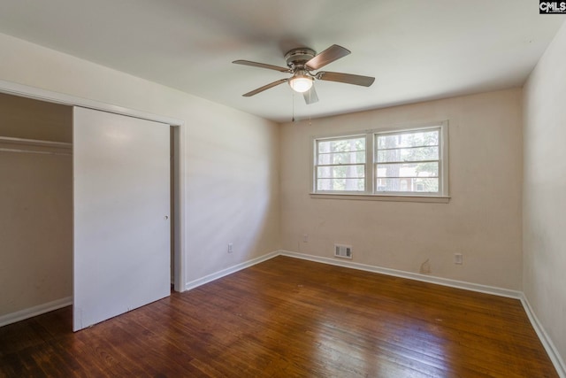 1748 Omarest Dr, Columbia, SC 29210 - unfurnished bedroom featuring wood finished floors, a closet, and a ceiling fan