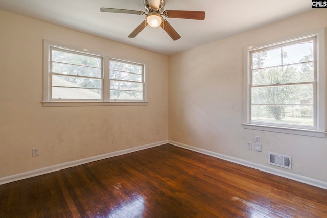 1748 Omarest Dr, Columbia, SC 29210 - empty room featuring plenty of natural light, hardwood / wood-style flooring, and a ceiling fan