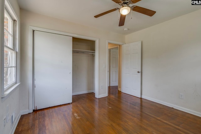 1748 Omarest Dr, Columbia, SC 29210 - unfurnished bedroom featuring wood finished floors, a closet, and a ceiling fan