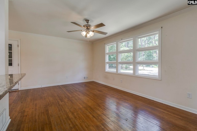1748 Omarest Dr, Columbia, SC 29210 - unfurnished room with a ceiling fan, dark wood finished floors, and crown molding