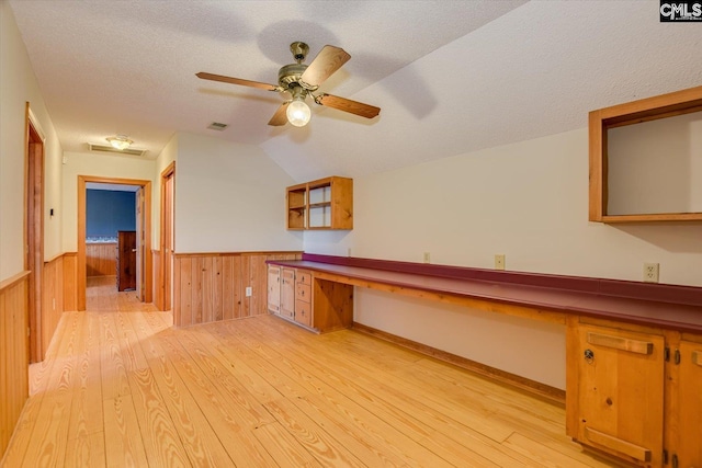 518 Pioneer Shores Rd, Prosperity, SC 29127 - bar featuring light wood finished floors, wainscoting, vaulted ceiling, a textured ceiling, and a ceiling fan