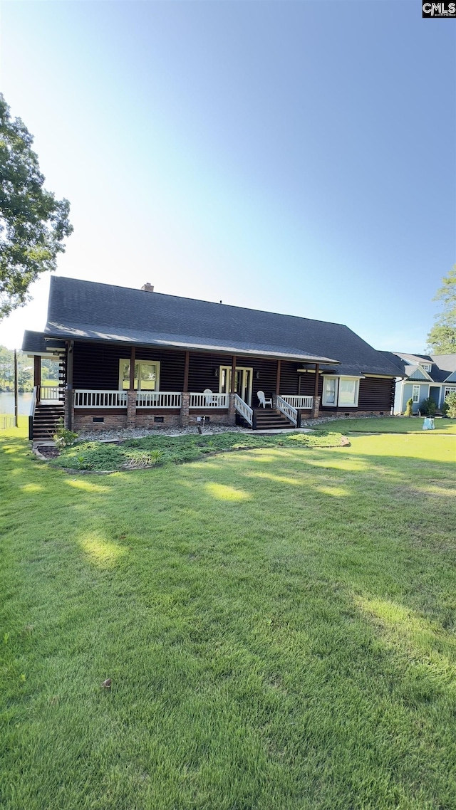 518 Pioneer Shores Rd, Prosperity, SC 29127 - view of front of home with a front yard, a porch, and a shingled roof