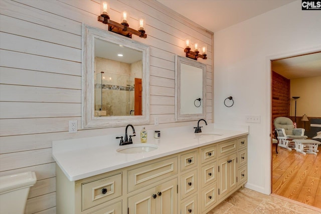 518 Pioneer Shores Rd, Prosperity, SC 29127 - full bath with double vanity, wood walls, and tiled shower