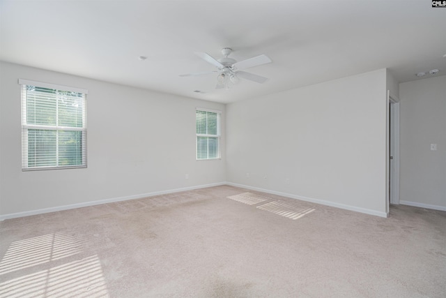 939 Sequoia Dr, Lexington, SC 29073 - spare room featuring light colored carpet, healthy amount of natural light, and ceiling fan