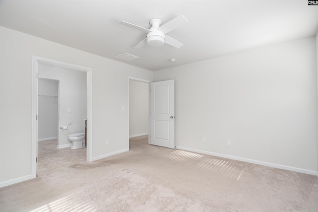 939 Sequoia Dr, Lexington, SC 29073 - unfurnished bedroom with light carpet, a spacious closet, ceiling fan, and a closet