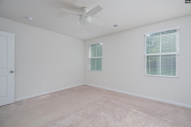 939 Sequoia Dr, Lexington, SC 29073 - carpeted empty room featuring ceiling fan, plenty of natural light, and a smoke detector
