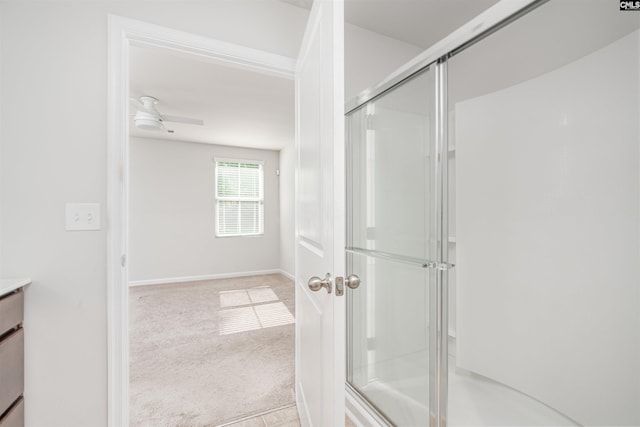 939 Sequoia Dr, Lexington, SC 29073 - bathroom with a shower with shower door, vanity, and a ceiling fan