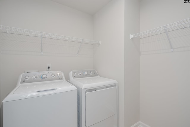 939 Sequoia Dr, Lexington, SC 29073 - laundry area with separate washer and dryer and baseboards