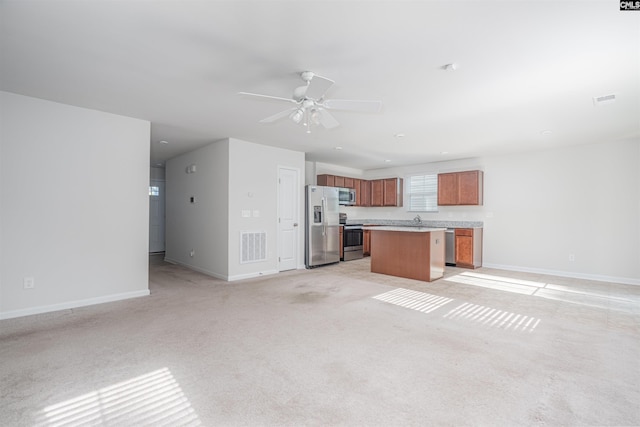 939 Sequoia Dr, Lexington, SC 29073 - unfurnished living room featuring a ceiling fan and light carpet