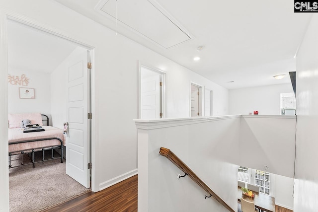 823 Queenshire Ln, Elgin, SC 29045 - corridor featuring attic access, an upstairs landing, and wood finished floors