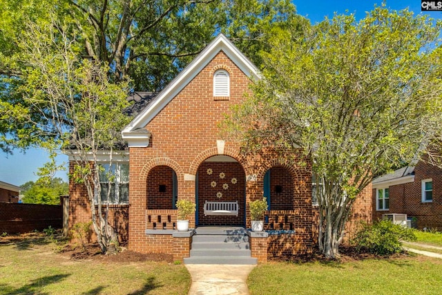 335-337 S Woodrow St, Columbia, SC 29205 - view of front facade featuring brick siding and a porch