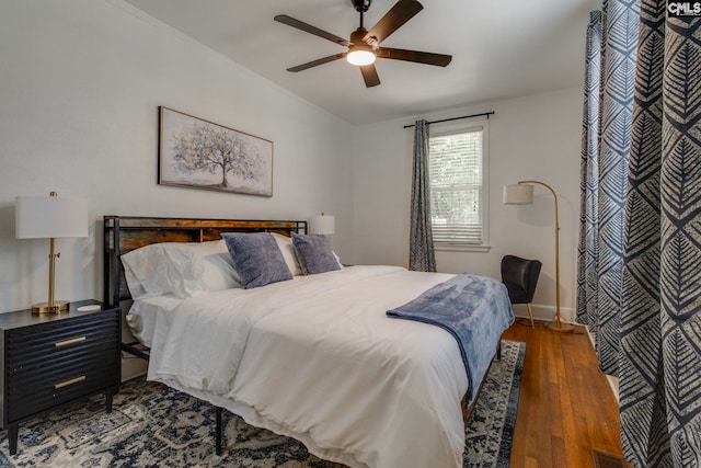 335-337 S Woodrow St, Columbia, SC 29205 - bedroom with wood finished floors and ceiling fan
