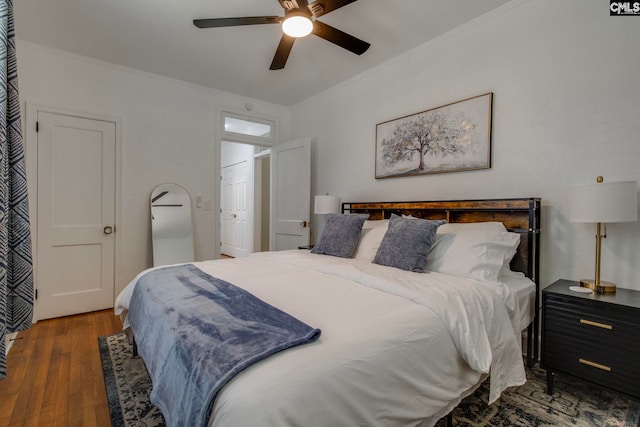 335-337 S Woodrow St, Columbia, SC 29205 - bedroom with ornamental molding, hardwood / wood-style flooring, and a ceiling fan