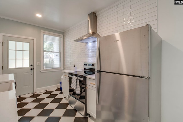 335-337 S Woodrow St, Columbia, SC 29205 - kitchen with appliances with stainless steel finishes, wall chimney range hood, light countertops, dark flooring, and ornamental molding