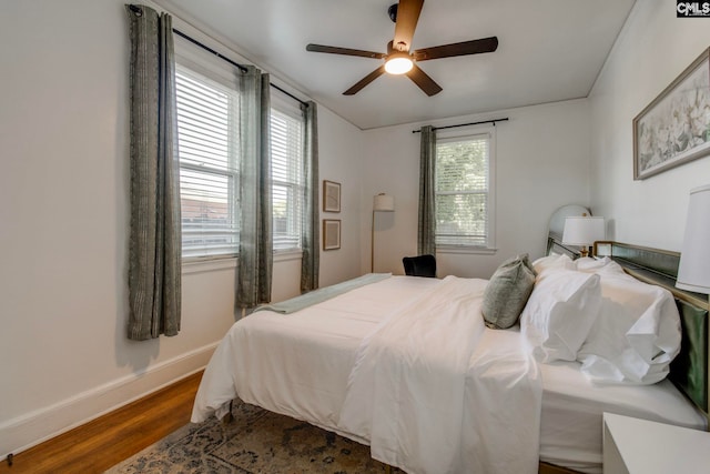 335-337 S Woodrow St, Columbia, SC 29205 - bedroom with wood finished floors and a ceiling fan